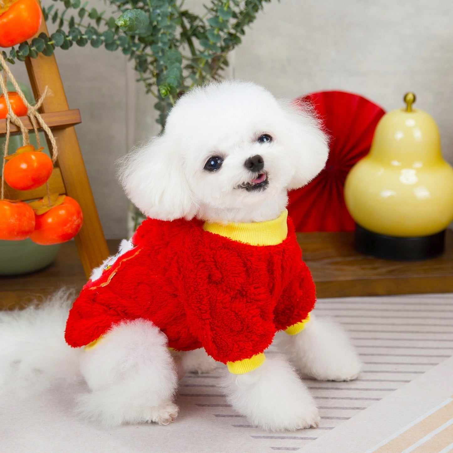 人気犬の服ペットの服小型犬猫は秋と冬に着用することができます暖かく快適な新年獅子舞フリースジャケット